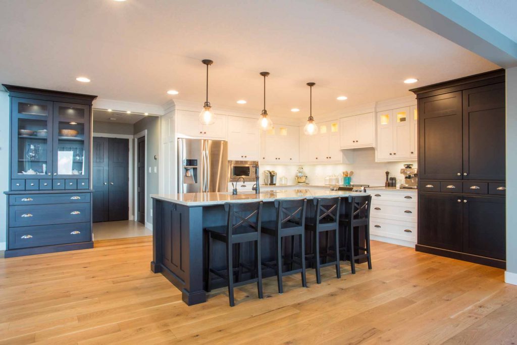 Newly cleaned kitchen with hardwood floors